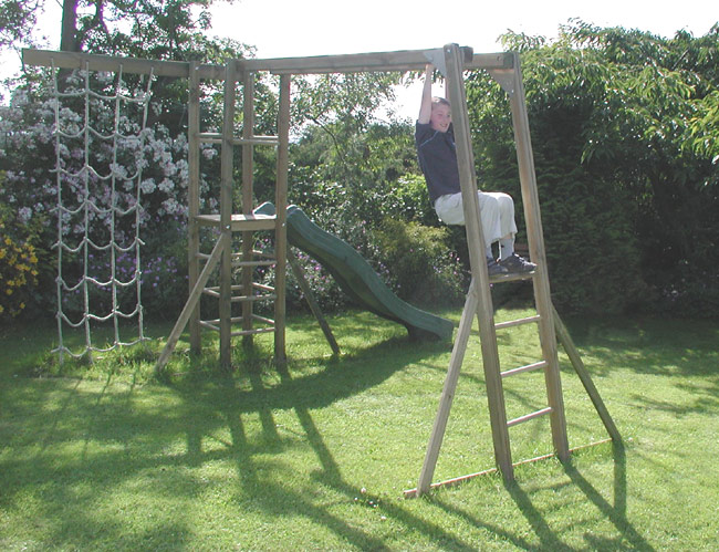 wooden climbing frame with monkey bars